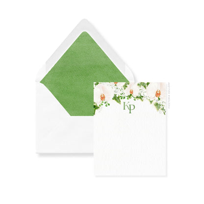 Orchid thank-you cards with KP monogram; pear-green-lined envelopes