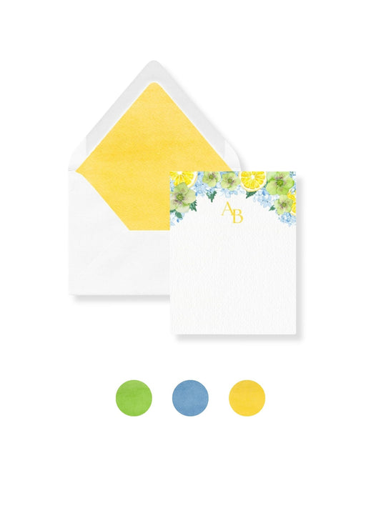 White envelope with yellow floral liner and gold AB monogram, personal stationery set