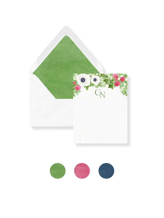 White envelope stationery set with floral liner, pear green flap, CN monogram, matching color swatches