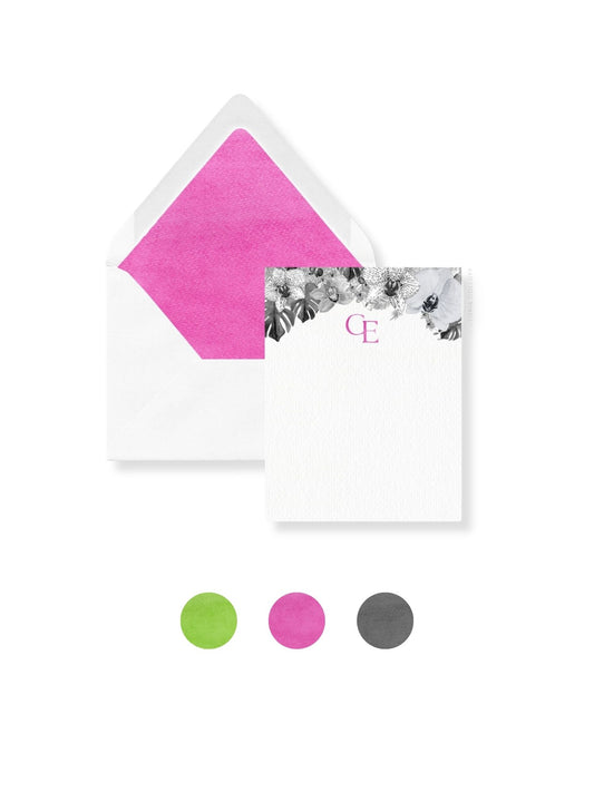 Personal stationery envelope with pink liner, floral watercolor band, and monogram CE