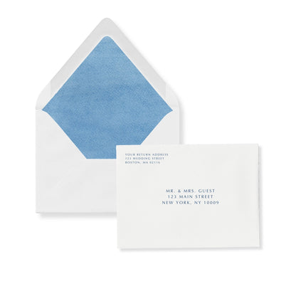 Invitation envelope with blue interior liner and white flap; card shows guest and return text