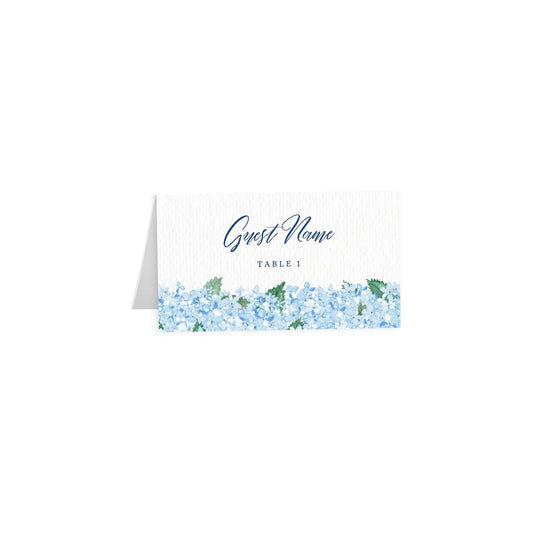 Hydrangea tent card with Guest Name in navy blue script and Table 1 text