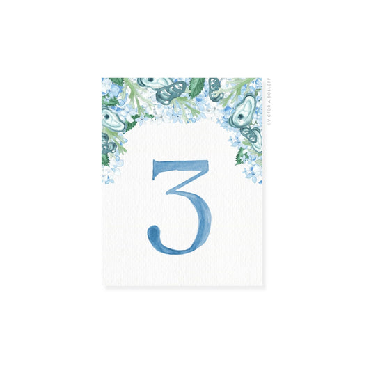 Table Number 3 in Ocean Blue with floral corner border