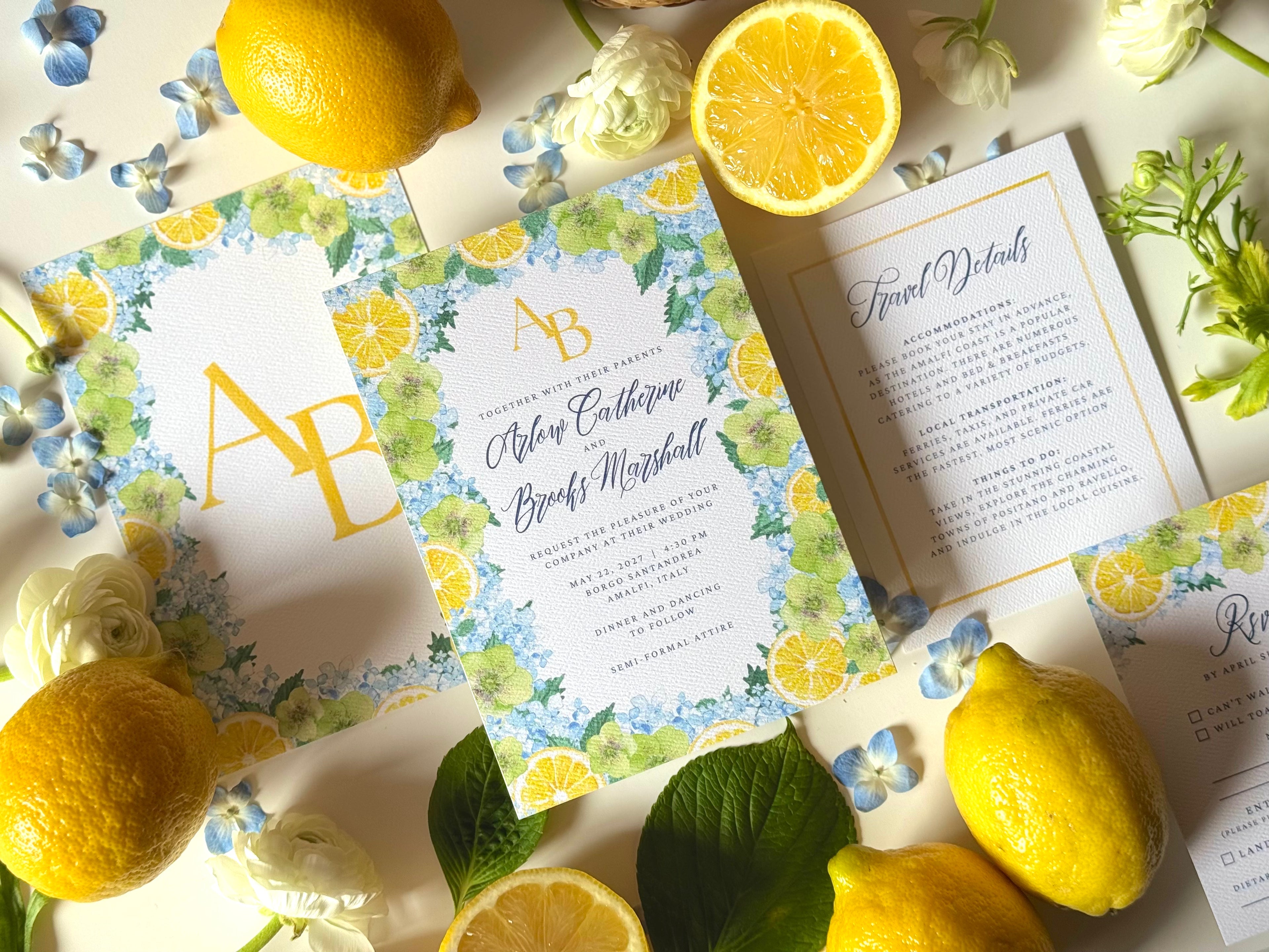Wedding invitation cards with lemons and flowers on a light background
