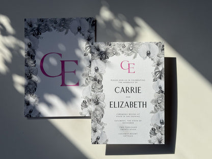 Wedding invitation card with floral watercolor border and magenta E monogram