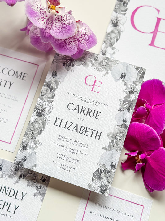 Carrie Collection watercolor wedding invitation with magenta monogram and floral border